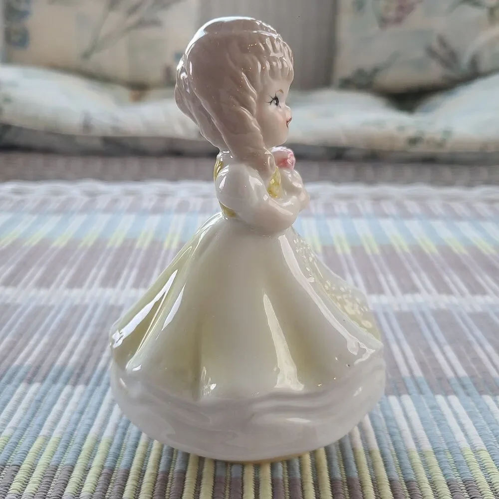 RARE Music Box Figurine With Lovely Young Girl Holding A Gift Plays Look Of Love